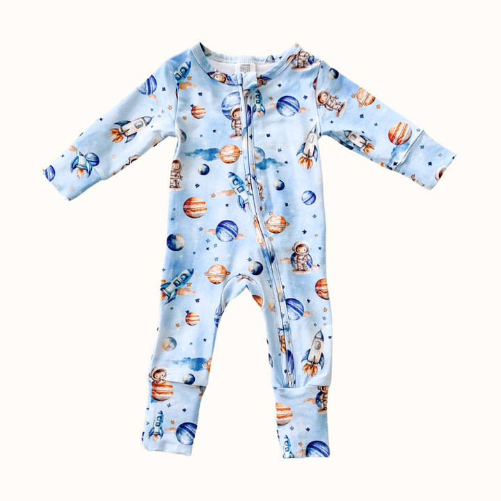 Space Rockets organic cotton baby onesie with a vibrant space-themed design, featuring spacemen, planets, and a two-way zip.