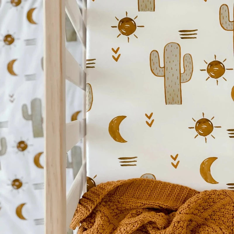 Snuggly Jacks Cot sheets are made in Australia to fit  a sheet size of 140 x 70. Cactus, sun, brown cotton fitted sheets.