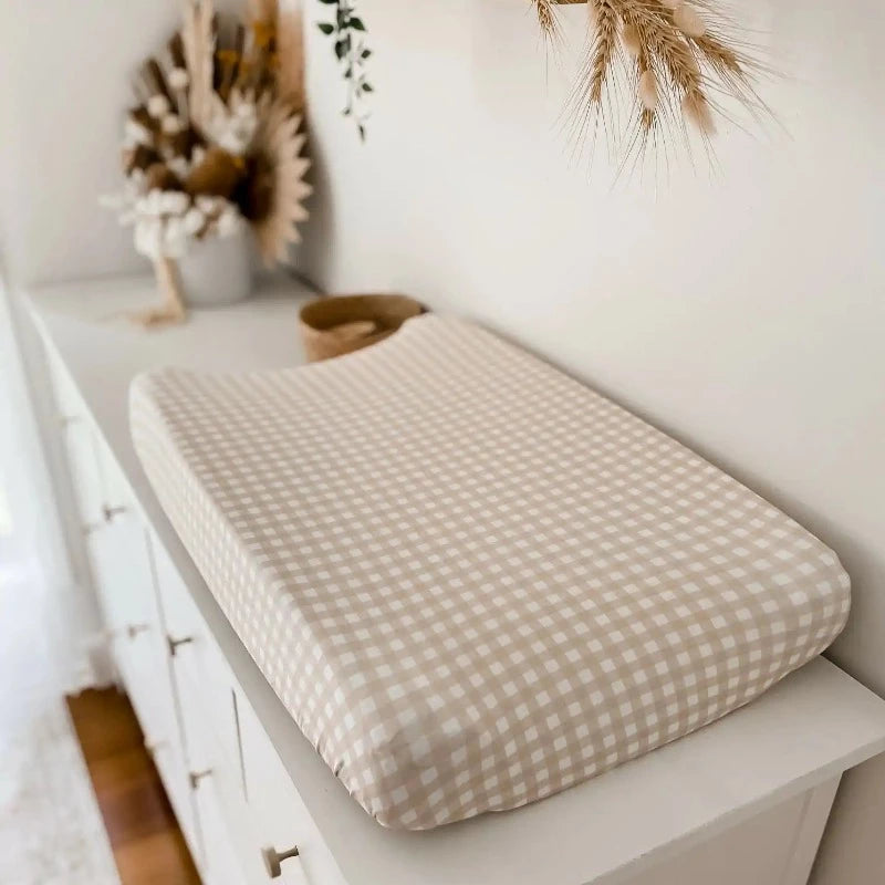 A snuggly jacks change mat cover is made from 95% natural organic cotton and can bring style to your designer nursery.