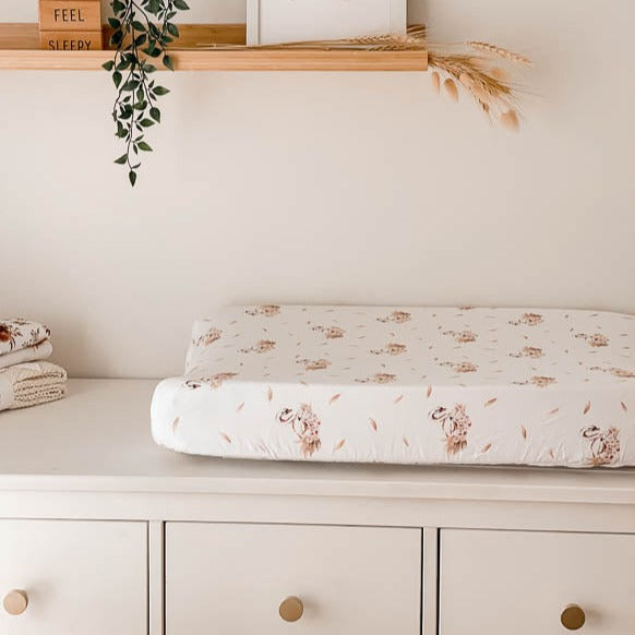 White chest of draws set up with a change mat and snuggly jacks australia Swan Bassinet Sheet / Change Mat Cover