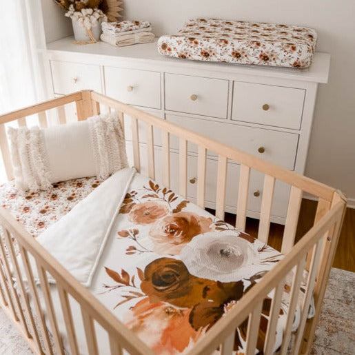 Full willow Nursery set including cot quilt, fitted sheet, bassinet sheet and wash cloth all presented in a babies nursery.